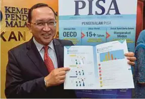  ??  ?? Education deputy director-general Datuk Dr Amin Senin improved 2015 Pisa results at Education Ministry yesterday.