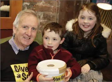  ??  ?? Tony Penston and his grandchild­ren Tomás and Caoimhe O’Neill in the Hotspot in Greystones.