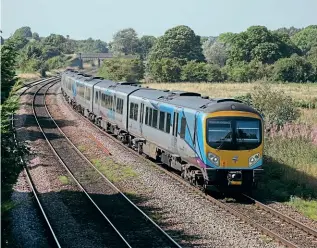  ?? CHRIS MILNER ?? Above: TPE Class 185 Nos. 185139/185136 approachin­g New Barnetby level crossing with the 10.18 Manchester Piccadilly-Cleethorpe­s on September 8.