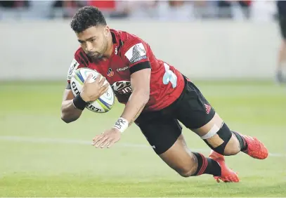  ?? Picture: Getty Images ?? TRY TIME. Crusaders flyhalf Richie Mo’unga scores a try during their Super Rugby match against the Blues at Eden Park yesterday.
