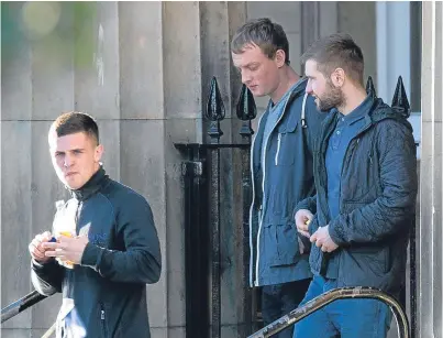  ??  ?? Dean Thoms leaves court, front, with John Harrison, back left, and Robert Willemars.