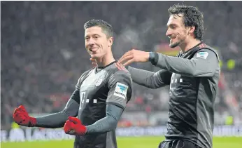  ??  ?? Bayern Munich striker Robert Lewandowsk­i, left, and defender Mats Hummels.