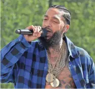  ?? NEILSON BARNARD/GETTY IMAGES ?? Nipsey Hussle performs before the 2018 BET Awards in Los Angeles.