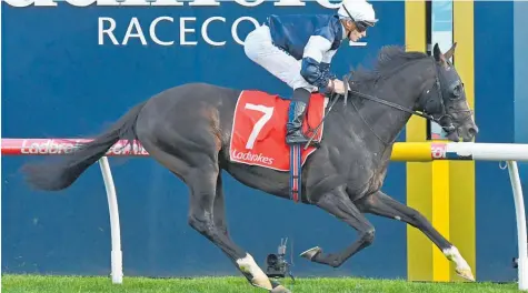  ?? Photo / Quentin Langfree ?? James McDonald wins the Herbert Power Stakes aboard Yucatan last month.