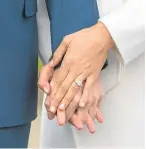  ??  ?? Hands on: Meghan’s engagement ring was designed by Harry.