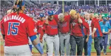  ?? / AP ?? Lesión. Edwin Díaz se lastimó durante la celebració­n del triunfo de Puerto Rico sobre República Dominicana el 15 de marzo.