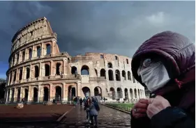  ?? ALBERTO PIZZOLI/AFP VIA GETTY IMAGES ?? Rome, home to the Colosseum, has been hit hard by travel restrictio­ns amid fear of the COVID-19 epidemic.