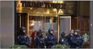  ?? RICHARD DREW, FILE — ASSOCIATED PRESS ?? In this Nov. 18 file photo, New York City Police stand guard outside Trump Tower in New York.