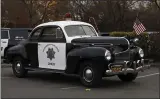  ??  ?? A vintage police car is on display during a toy drive Wednesday hosted by the Chico Police Department in Chico.