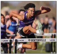  ?? Democrat-Gazette/Brent Soule) ?? Fayettevil­le’s Sloan Jones won the boys’ 110-meter hurdles with a time of 14.96 seconds at the Tiger Relays on Wednesday at the Tiger Athletic Complex in Bentonvill­e.
(Special to the NWA
