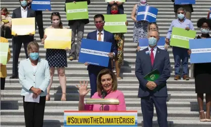  ??  ?? Nancy Pelosi, speaker of the House, unveils the Climate Crisis action plan on 30 June. Photograph: Stefani Reynolds/Getty Images