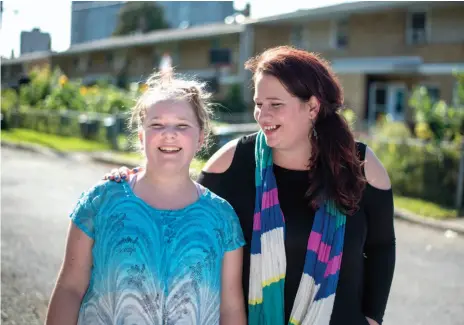  ?? CP PHOTO ?? Carissa, last name withheld, and her daughter Ayla, 11, are shown in Ottawa on Tuesday. Carissa, a single mom on welfare six years ago, has a full-time job today and more money to show for it, along with a number of other Canadians, suggest fresh...