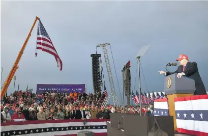  ?? AFP ?? Trump en un acto de campaña en el aeropuerto de Muskegon, estado de Michigan.