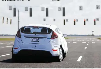  ??  ?? This driverless, computer-controlled vehicle is constructe­d of foam and canvas and is used at the SMARTCente­r testing grounds to simulate real traffic scenarios.