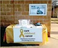  ??  ?? This reception table featuring promotiona­l items for sale including T-shirts and wrist bands greeted fans entering the main gate during the third annual Jarren Sorters Memorial Baseball Tournament hosted by Prairie Grove over spring break. Funds raised are donated in the battle against childhood cancer, which cut short Jarren Sorters life one month before his 16th birthday on Aug. 11, 2016.