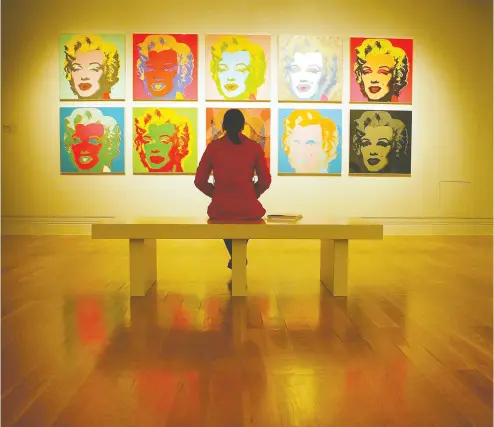  ?? BEN STANSALL / AFP / GETY IMAGES ?? Andy Warhol’s silkscreen prints of Marilyn Monroe were among the works that launched him into the mainstream.