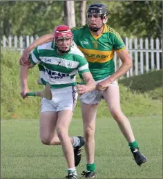  ??  ?? Brandon O’Connor of the Shamrocks being troubled by Blackwater’s Denis Carroll in St. Patrick’s Park.