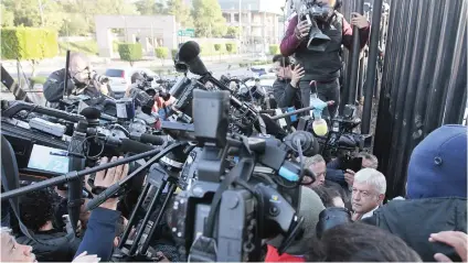  ?? Picture:EPA-EFE ?? MEDIA FRENZY. Andres Manuel Lopez Obrador after voting at an electoral college in Mexico City, Mexico, on Sunday. Lopez Obrador won the presidenti­al election by a record margin.