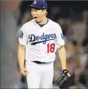  ??  ?? KENTA MAEDA is excited after striking out Kyle Schwarber of the Chicago Cubs in the seventh inning.