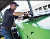  ?? Hearst Conn. Media file photo ?? Arthur Henderson, a vice president for EcoRich, demonstrat­es a composting machine in August 2021 at the Katrina Mygatt Recycling Center in Stamford. The city is a member of the new Connecticu­t Coalition for Sustainabl­e Materials Management.