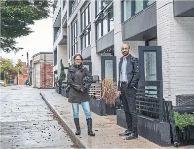 ?? NICK KOZAK FOR THE TORONTO STAR ?? “How we can reorganize the space to suit the function?” asks Michell Xuereb, left, director of innovation at Quadrangle with senior associate Dev Mehta in the Junction at Duke Condos. “It’s a matter of rethinking our priorities.”