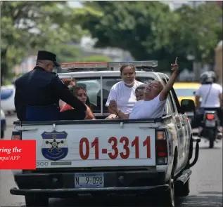  ?? Photo: Nampa/AFP ?? People captured for alleged gang links are escorted by the National Civil Police during the state of emergency declared by the Salvadoran government at the San Salvador penal centre.