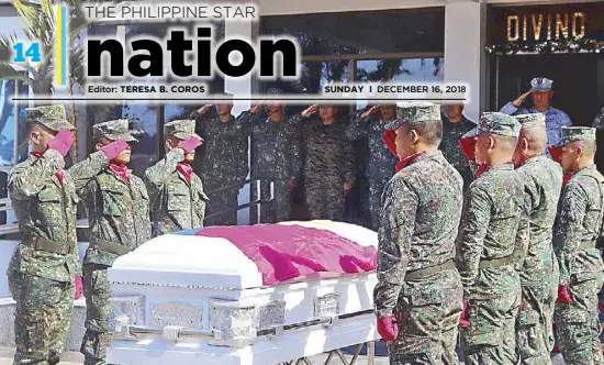  ??  ?? Handout photo from the Naval Forces Western Mindanao shows Marine and Naval officers paying their last respects to a comrade killed in a clash with Abu Sayyaf bandits in Patikul, Sulu on Thursday.