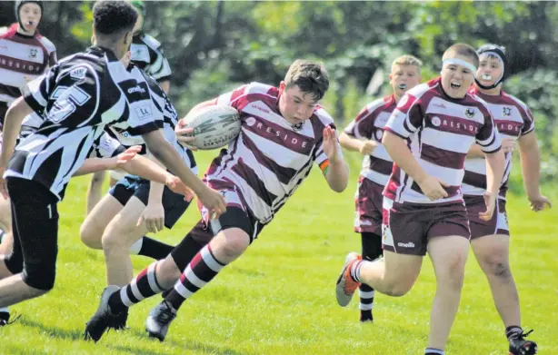  ?? Bruce Myers ?? Garrett Myers and James O’Connell on the rampage for Rochdale under 15s at Broughton Park