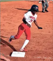  ??  ?? Jerrian Jackson rounds third during the Lady Warriors’ sweep of Pace Academy in last week’s Class AAA first round series. (Photo by Lindsey Thomas)