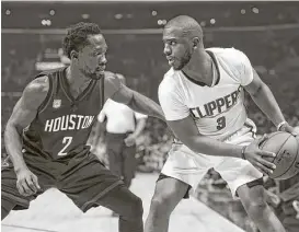  ?? Kelvin Kuo / Associated Press ?? When Chris Paul, right, and Patrick Beverley match up on the court again, they’ll do so in opposite jerseys since Beverley was part of the megadeal that brought Paul to Houston and sent Beverley to Los Angeles.