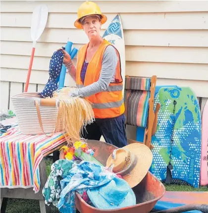  ?? Photo / Supplied ?? Dorothea (Dotty) Gubersnitt of Te Pahu¯ , sorting through the deposited items.