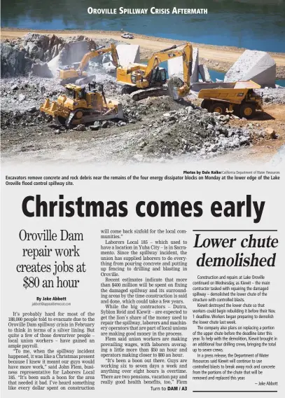  ?? Jabbott@appealdemo­crat.com Photos by Dale Kolke/ California Department of Water Resources ?? Excavators remove concrete and rock debris near the remains of the four energy dissipator blocks on Monday at the lower edge of the Lake Oroville flood control spillway site.