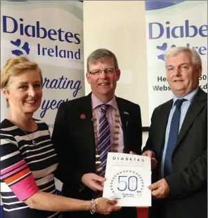  ??  ?? CEO Diabetes Ireland Kieran O’Leary and Secretary Sligo Branch Suzanne Donnelly present a copy of the recently published history of the national group to the Cathaoirle­ach of Sligo County Council Councillor Hubert Keaney