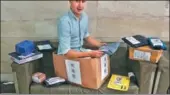  ?? PROVIDED TO CHINA DAILY ?? An internatio­nal student from Europe checks the parcels couriered by e-commerce firms at a university dormitory in Beijing.