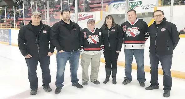  ?? — TWITTER FILES ?? Kimberley Dynamiters fans were first introduced to would-be donor, Mike Gould, second from left, of Calgary, on Oct. 13 during a pre-game ceremony when he announced he would donate $7.5 million to the hockey team.