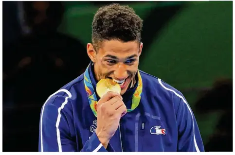  ?? ©MAXPPP ?? Tony Yoka savoure sa médaille d’or aux Jeux olympiques de Rio.