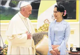  ?? MAX ROSSI / POOL / VIA ASSOCIATED PRESS ?? Pope Francis meets with Aung San Suu Kyi, Myanmar’s civilian leader, Tuesday in Naypyitaw, the Asian nation’s new capital.