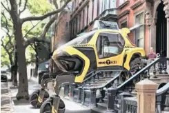  ??  ?? THE ‘walking car’ is envisioned with articulati­ng legs to traverse any terrain making it ideal for mobility for disabled persons as well as for emergency responses. | ROBYN BECK AFP