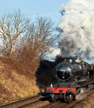  ?? CLIVE HANLEY ?? “Just what I remember…” ‘O4’ No. 63601 plods along Quorn straight in January 2012 with a string of mineral wagons.