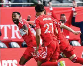  ?? MATT MARTON/AP ?? Fire forward Kellyn Acosta (left) celebrates his goal in the 99th minute.