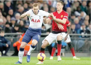  ?? Photo: AFP ?? Tottenham Hotspur’s English striker Harry Kane (L) vies with Manchester United’s Serbian midfielder Nemanja Matic (R) during the English Premier League match at Wembley Stadium in London, yesterday
