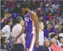  ?? TIM NWACHUKWU/GETTY IMAGES ?? Joel Embiid of the Philadelph­ia 76ers continued his regrettabl­e habit of pointing the finger at those around him. He says he will be back with the Sixers next season.