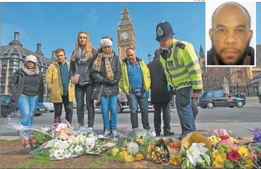  ?? FOTOS: AFP ?? DOLOR. Policías y transeúnte­s dejaron ayer ofrendas florales frente al Big Ben, en el centro de la capital del Reino Unido.