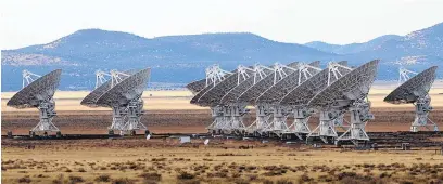  ?? JOURNAL ?? Radio antennas in a tight formation at the Very Large Array near Socorro.