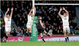  ??  ?? Beauden Barrett kicks his first drop goal in 71 tests for the All Blacks.