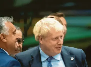  ?? Foto: Stefan Rousseau, dpa ?? Gelöst wie seit Tagen nicht mehr: Der britische Premiermin­ister Boris Johnson zeigte sich zufrieden über den Brexit-Deal, der in Brüssel ausgehande­lt wurde. Doch ob der Kompromiss Bestand haben wird, ist höchst fraglich.