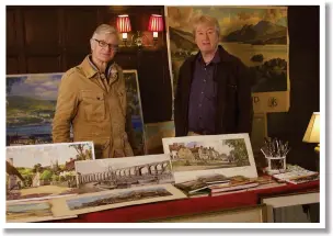  ??  ?? Nick Crane (left) and Greg Norden surrounded by just some of Greg’s collection of nostalgic paintings and prints