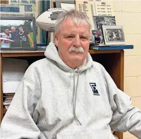  ?? JAY PINSONNAUL­T ?? Exeter High School athletic director Bill Ball sits in his office and talks about his 46-year career at Exeter. Ball will step down as athletic director at the end of the current school year, but will still continue to serve as head football coach. Ball served as Exeter's athletic director for the last 26 years.