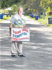  ?? MIKE STOCKER/STAFF PHOTOGRAPH­ER ?? John Jacobs has lived on Lee street for more than 30 years and is upset that the city is going to change its name.