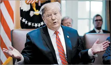  ?? MANDEL NGAN/GETTY-AFP ?? “The wall is getting built regardless,” said President Donald Trump during a Cabinet meeting Tuesday at the White House.